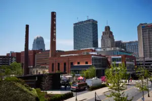 Winston-Salem skyline with tall brick chimneys raising in the foregroud.