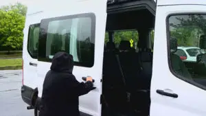 Person closing white van door