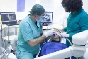 Dentist working on patient