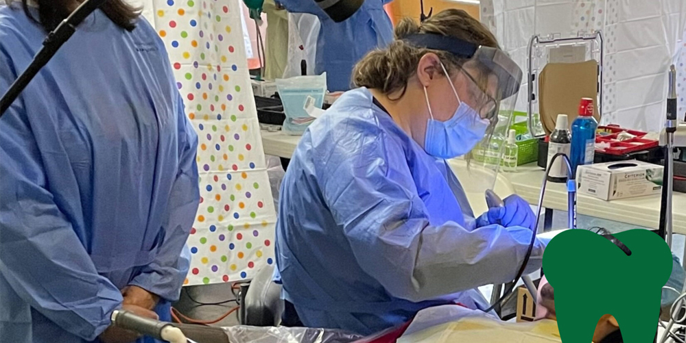 Dentist working on patient