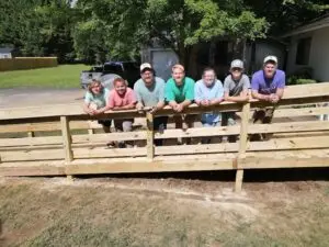 Volunteers on a ramp