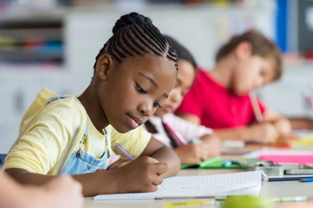 School girl writing