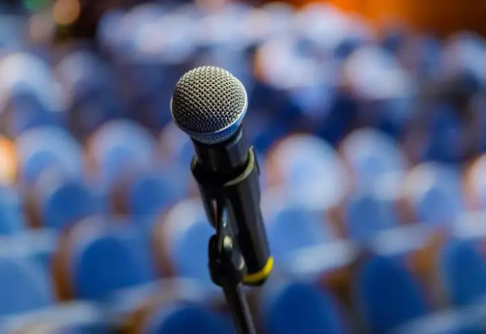 Close up of microphone on a stage