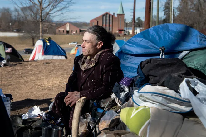 Homeless man at a camp