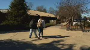 Two students walking to class