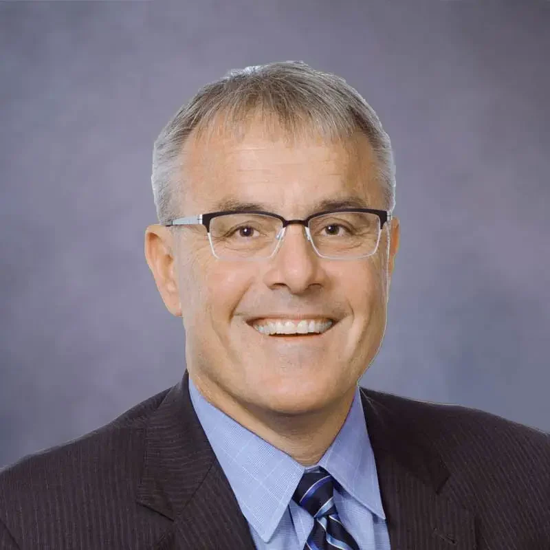 Mark-headshotcroppedgrey