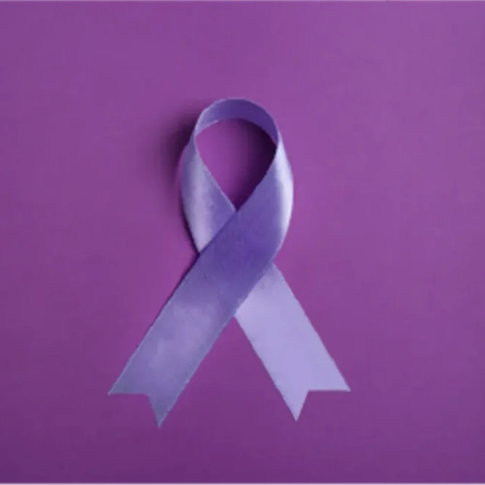 Purple ribbon on purple backdrop