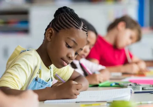 School girl writing